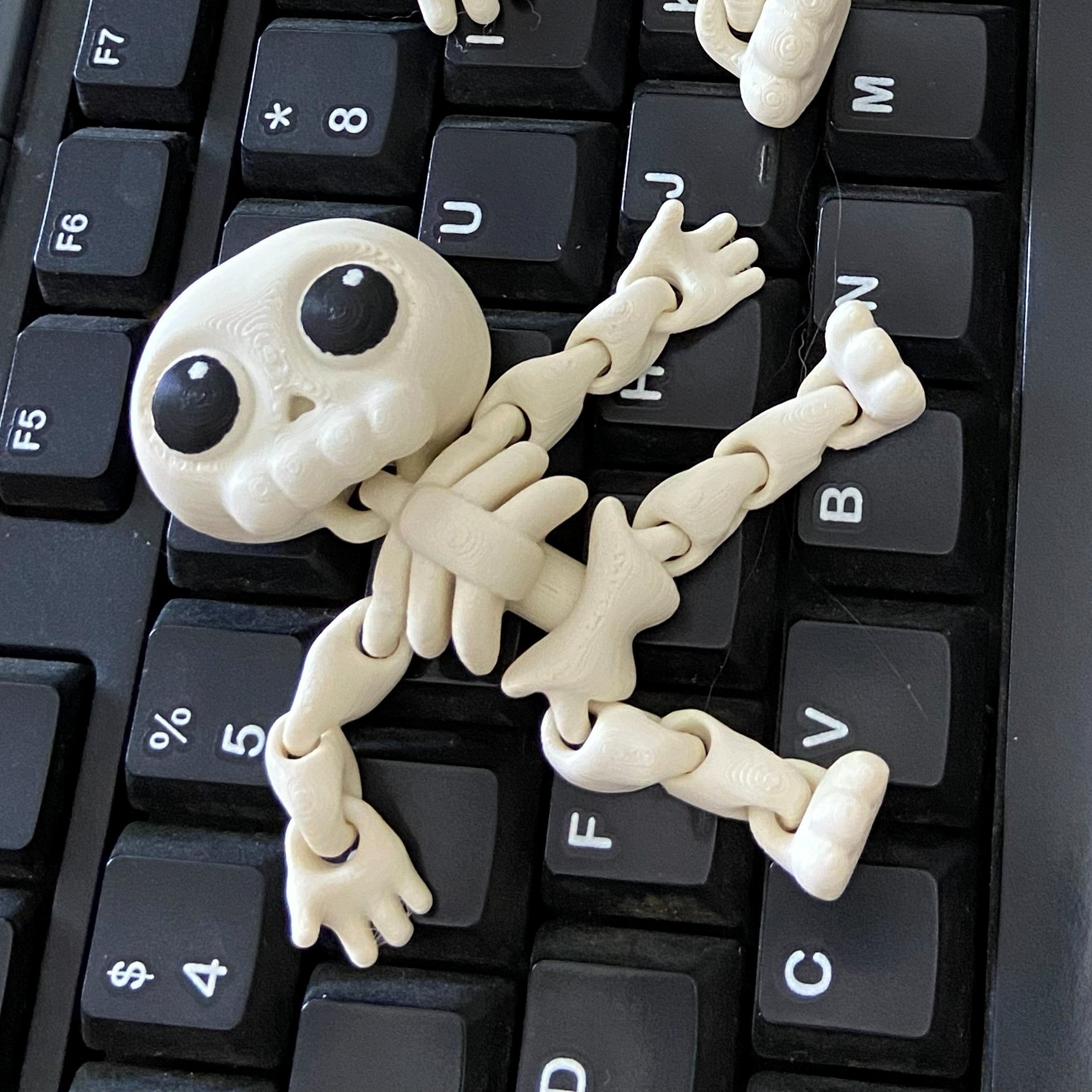 Not-So-Spooky Skeleton Fidget -3d Printed Desk Buddy & Keychain