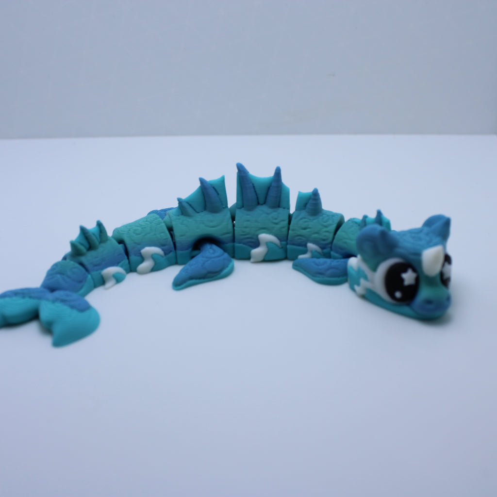 Cecelia the Sea Serpent Fidget - 3d printed desk companion